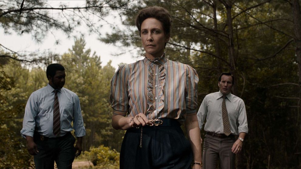 Keith Arthur Bolden as Sgt. Clay, Vera Farmiga as Lorraine Warren and  Patrick Wilson as Ed Warren in a scene from "The Conjuring: The Devil Made Me Do It."