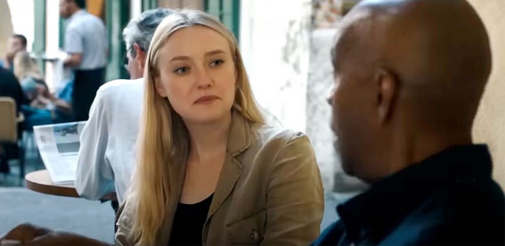 PHOTO: Dakota Fanning and Denzel Washington in a scene from the movie The Equalizer 3.