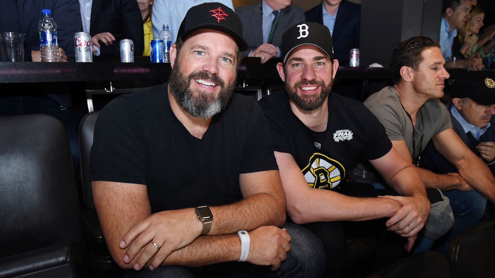 PHOTO: David Denman and John Krasinski of the tv show "The Office" during the game of the Boston Bruins against the St. Louis Blues in Game Seven of the Stanley Cup Final during the 2019 NHL Stanley Cup Playoffs on June 12, 2019 in Boston.