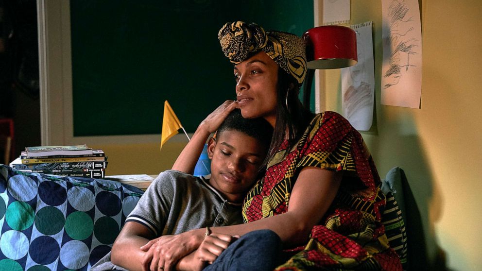 Lonnie Chavis, left, as Gunner Boone, and Rosario Dawson, as Mary Boone, in a scene from "The Water Man."