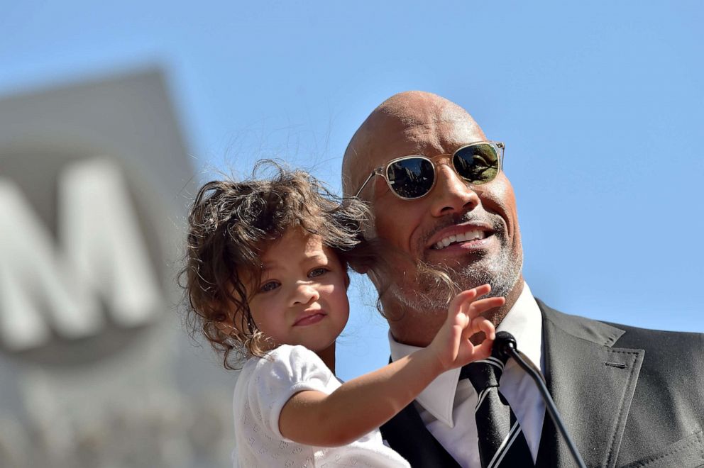 PHOTO: Actor Dwayne Johnson and daughter Jasmine Johnson attend the ceremony honoring Dwayne Johnson with star on the Hollywood Walk of Fame on Dec. 13, 2017 in Hollywood, Calif.