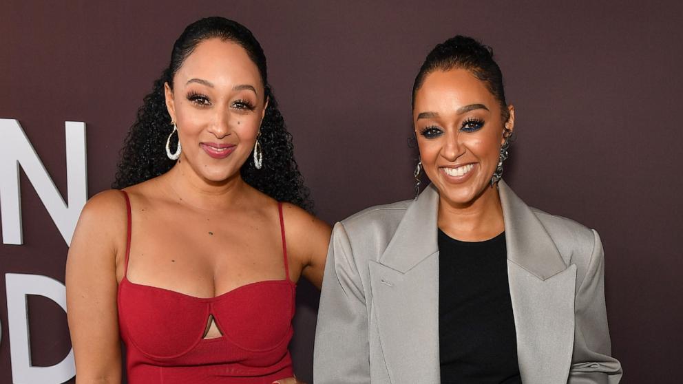 PHOTO: Tamera Mowry, left, and Tia Mowry attend the 2024 ESSENCE Black Women In Hollywood Awards Ceremony at Academy Museum of Motion Pictures, March 7, 2024, in Los Angeles.