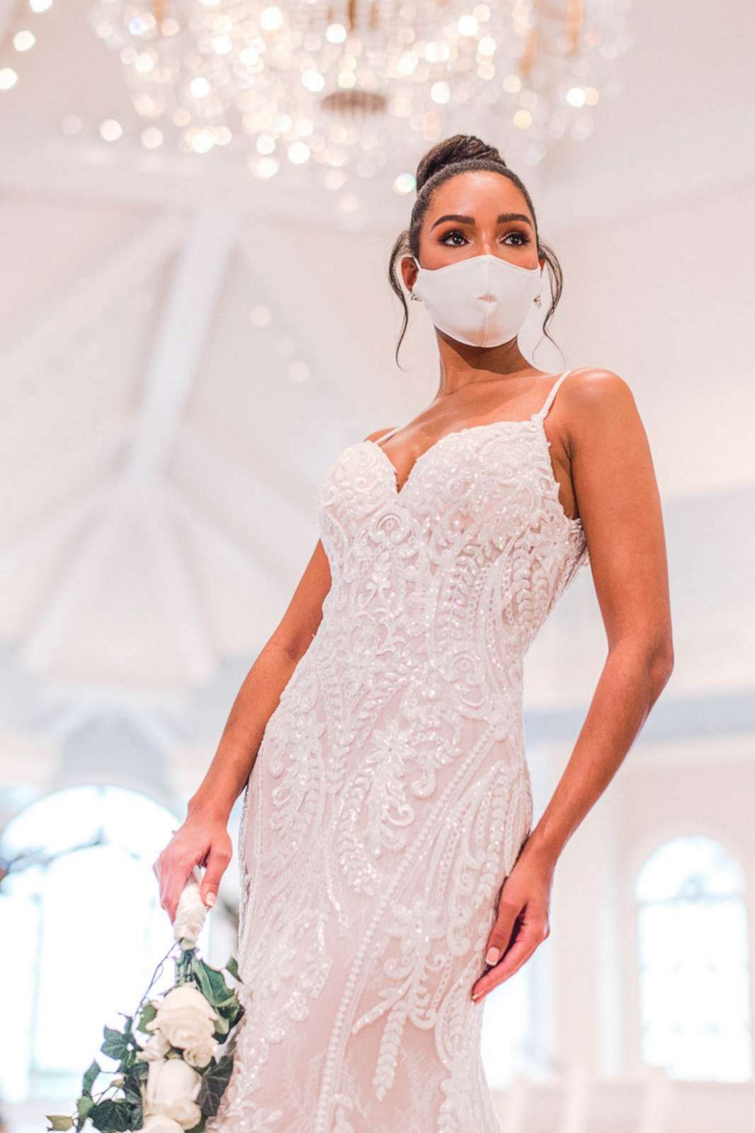 PHOTO: Model wears Disney Weddings Mainline Tiana Dress, which has a fun vintage flair.