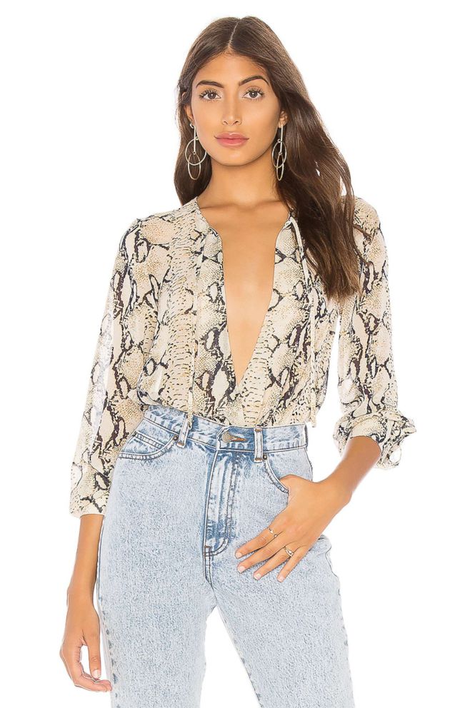 PHOTO: Style Hint: If you haven't tried a bodysuit blouse, this lightweight one in a snakeskin might inspire you. We love it because it creates the perfect tucked-in look without having to bother with extra fabric in your skinniest jeans.