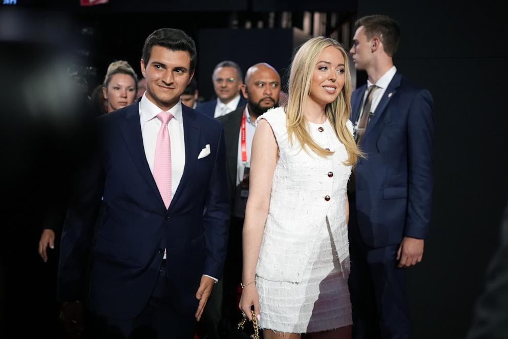 PHOTO: Tiffany Trump walks with her husband Michael Boulos on the second day of the Republican National Convention, July 16, 2024, in Milwaukee.