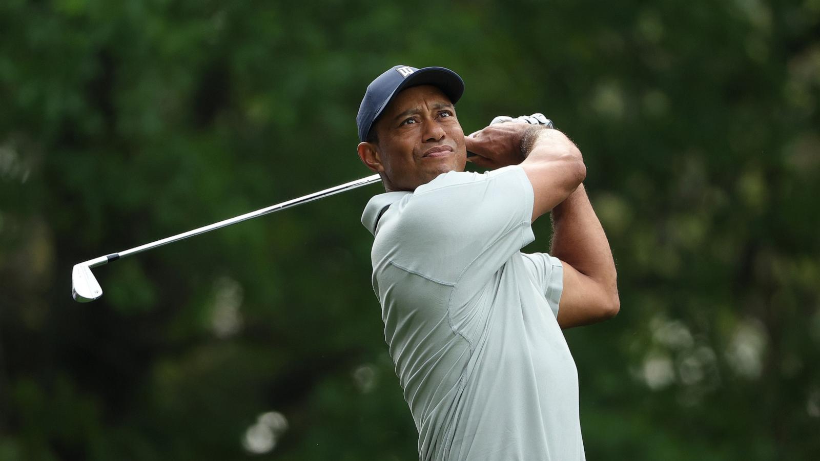 PHOTO: Tiger Woods of the United States plays his shot from the fourth tee during a practice round prior to the 2023 Masters Tournament at Augusta National Golf Club, April 4, 2023, in Augusta, Ga.