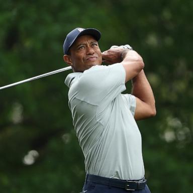 PHOTO: Tiger Woods of the United States plays his shot from the fourth tee during a practice round prior to the 2023 Masters Tournament at Augusta National Golf Club, April 4, 2023, in Augusta, Ga.