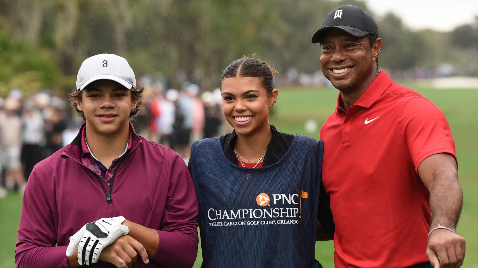 PHOTO: Tiger Woods poses with his son, Charlie and his daughter, Sam, before teeing off on the first hole during the final round of the PNC Championship at the Ritz-Carlton Golf Club in Orlando, Fla., Dec. 17, 2023.