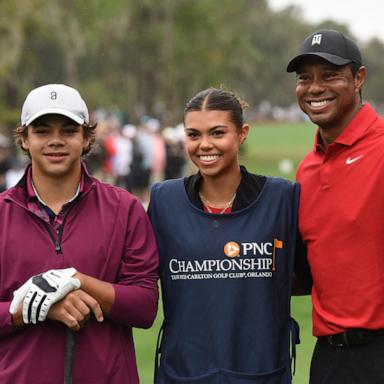 PHOTO: Tiger Woods poses with his son, Charlie and his daughter, Sam, before teeing off on the first hole during the final round of the PNC Championship at the Ritz-Carlton Golf Club in Orlando, Fla., Dec. 17, 2023.