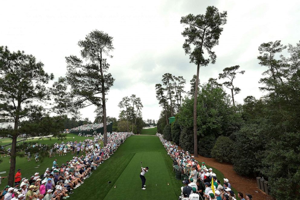PHOTO: Tiger Woods of the United States plays his shot from the 18th tee during the first round of the 2023 Masters Tournament at Augusta National Golf Club on April 6, 2023, in Augusta, Ga.