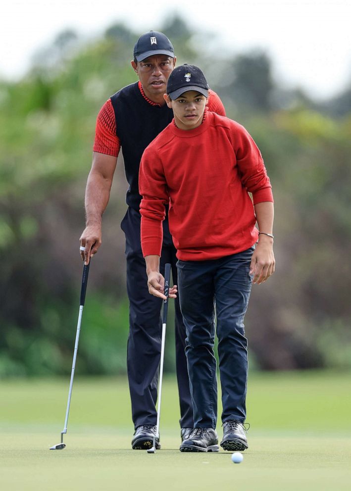 PHOTO: Tiger Woods with his son Charlie Woods during the final round of the 2022 PNC Championship at The Ritz-Carlton Golf Club on Dec. 18, 2022, in Orlando, Fla.