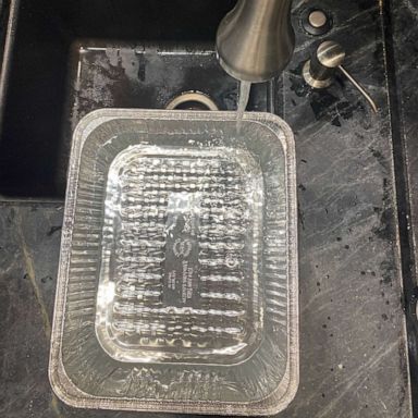 PHOTO: A foil tray filled with water to be frozen.
