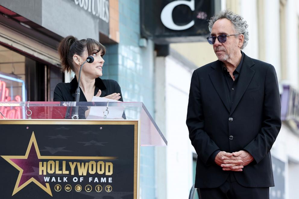 PHOTO: Winona Ryder (L) and Tim Burton (R) attend Tim Burton's Hollywood Walk of Fame Star ceremony, on Sept. 3, 2024, in Hollywood, Calif.