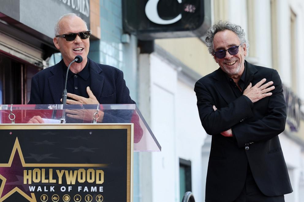 PHOTO: Michael Keaton (L) and Tim Burton (R) attend Tim Burton's Hollywood Walk of Fame Star ceremony, on Sept. 3, 2024, in Hollywood, Calif.