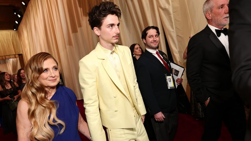 PHOTO: Timothee Chalamet (C) attends the 97th Annual Oscars March 02, 2025 in Hollywood,.