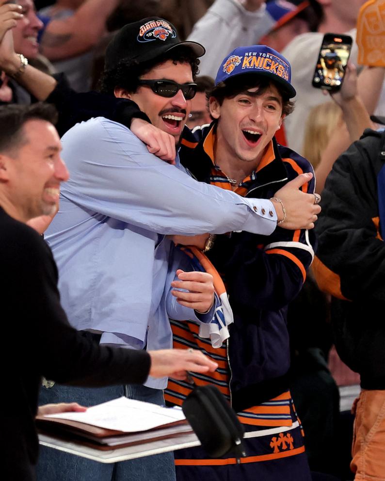 PHOTO: Timothee Chalamet celebrates with Bad Bunny during the fourth quarter of game six in the second round of the 2025 NBA Playoffs between the New York Knicks and the Boston Celtics at Madison Square Garden, on May 16, 2025, in New York.