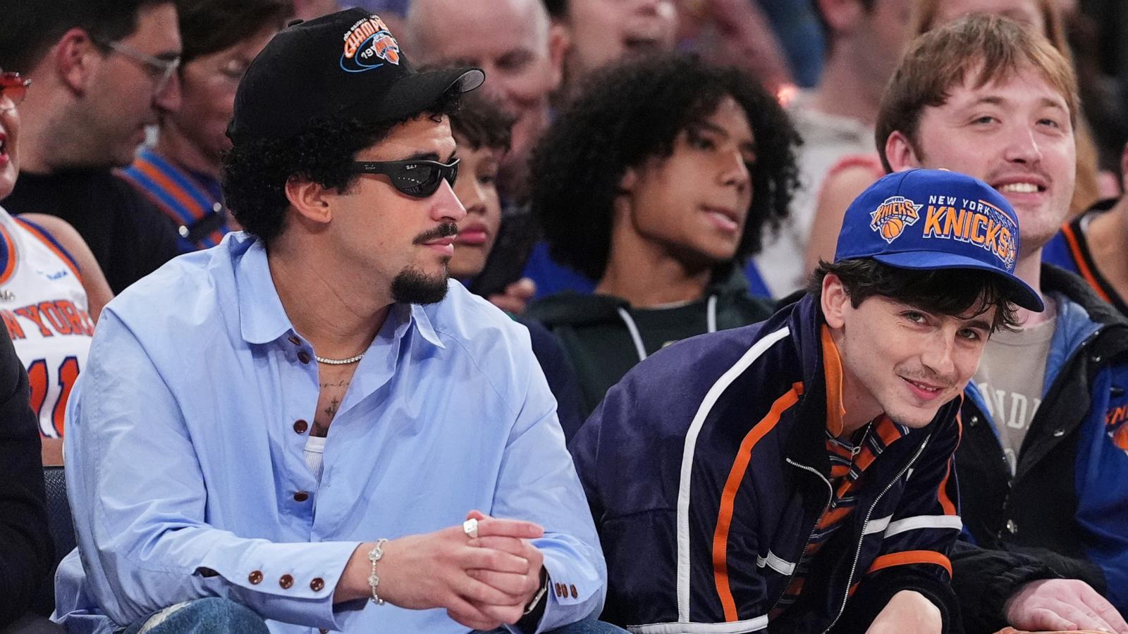 PHOTO: Actor Timothee Chalamet, right, and Bad Bunny, left, watch during the second half of Game 6 in the Eastern Conference semifinals of the NBA basketball playoffs between the New York Knicks and the Boston Celtics, on May 16, 2025, in New York.