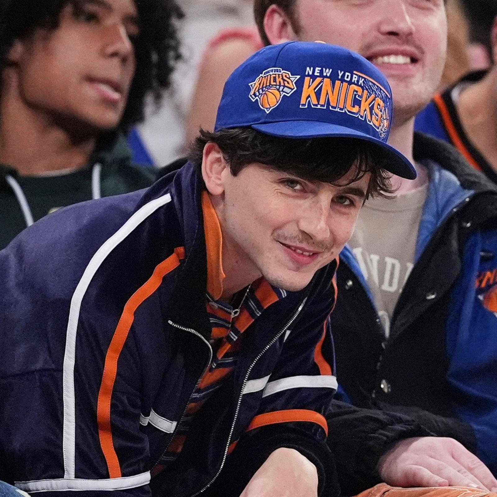 PHOTO: Actor Timothee Chalamet, right, and Bad Bunny, left, watch during the second half of Game 6 in the Eastern Conference semifinals of the NBA basketball playoffs between the New York Knicks and the Boston Celtics, on May 16, 2025, in New York.