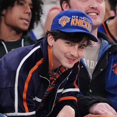 PHOTO: Actor Timothee Chalamet, right, and Bad Bunny, left, watch during the second half of Game 6 in the Eastern Conference semifinals of the NBA basketball playoffs between the New York Knicks and the Boston Celtics, on May 16, 2025, in New York. 