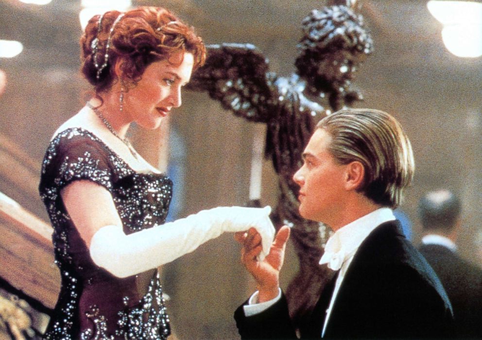 PHOTO: Kate Winslet offers her hand to Leonardo DiCaprio in a scene from the film "Titanic," 1997.