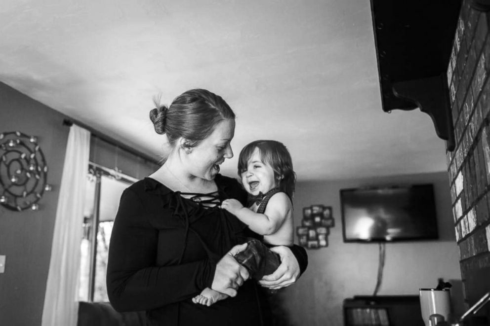 PHOTO: Rena Sickles of Toledo, Wash., holds her 1-year-old son Titus, a heart transplant survivor.