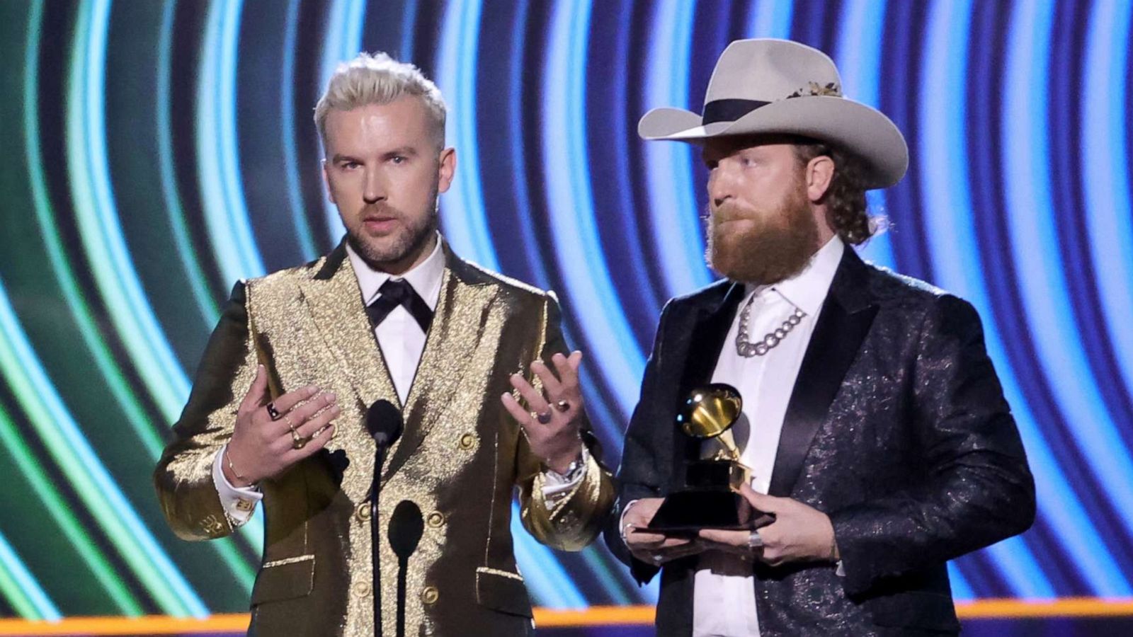 PHOTO: T.J. Osborne and John Osborne of Brothers Osborne accept the Best Country Duo/Group Performance award onstage 64th GRAMMY Awards Premiere Ceremony at MGM Grand Marquee Ballroom, April 3, 2022, in Las Vegas.