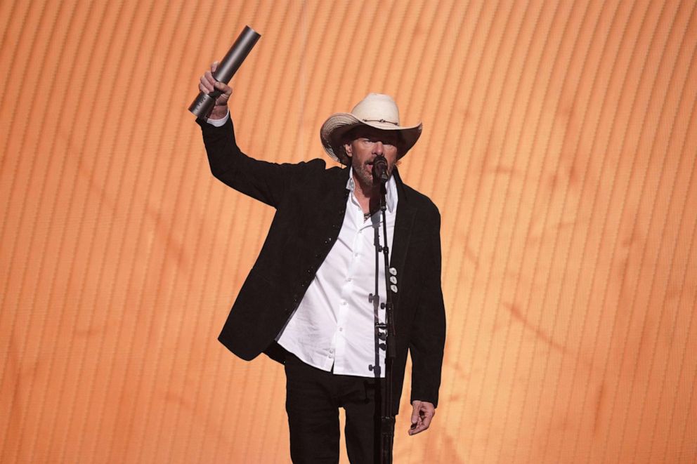 PHOTO: Honoree Toby Keith accepts the Country Icon award on stage during the 2023 People's Choice Country Awards held at the Grand Ole Opry House on Sept. 28, 2023 in Nashville, Tenn.