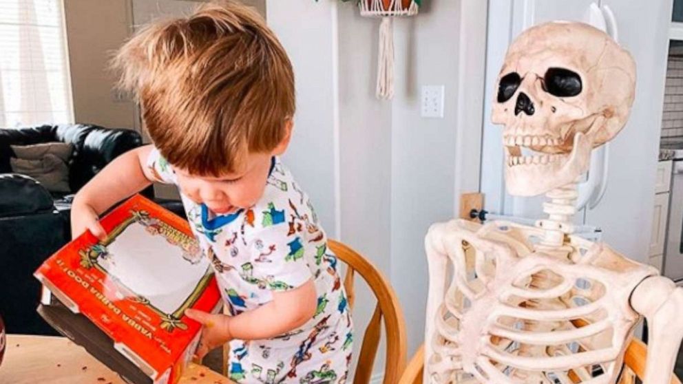This 2-year-old brings a 5-foot skeleton with him everywhere he goes