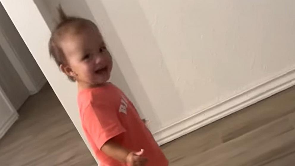 PHOTO: Karlie Miller captured her 1-year-old daughter's reaction to trying on her squeaky shoes for the first time.