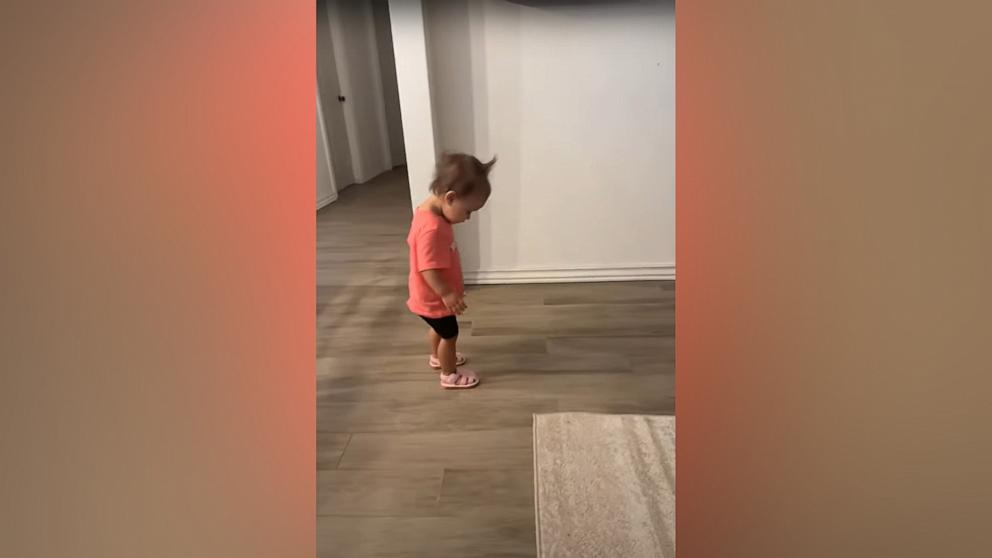 PHOTO: Karlie Miller captured her 1-year-old daughter's reaction to trying on her squeaky shoes for the first time.