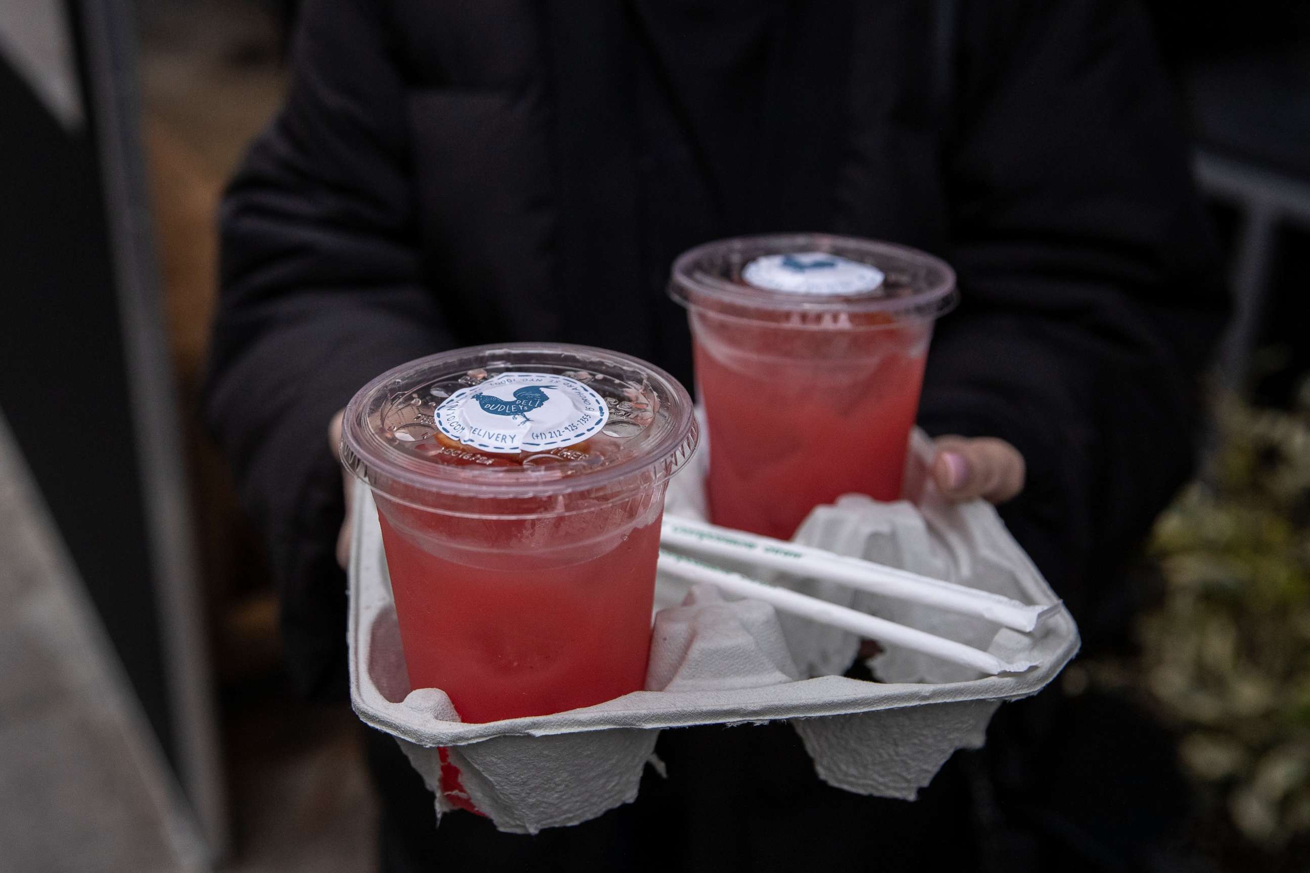 PHOTO: Cocktails are for sale to go at Dudley's bar and restaurant in Manhattan during the COVID-19 outbreak, March 19, 2020, in New York.