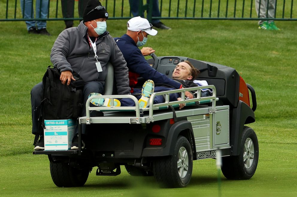 PHOTO: Tom Felton is carted off the course after collapsing during the celebrity matches ahead of the 43rd Ryder Cup at Whistling Straits, Sept. 23, 2021, in Kohler, Wis.