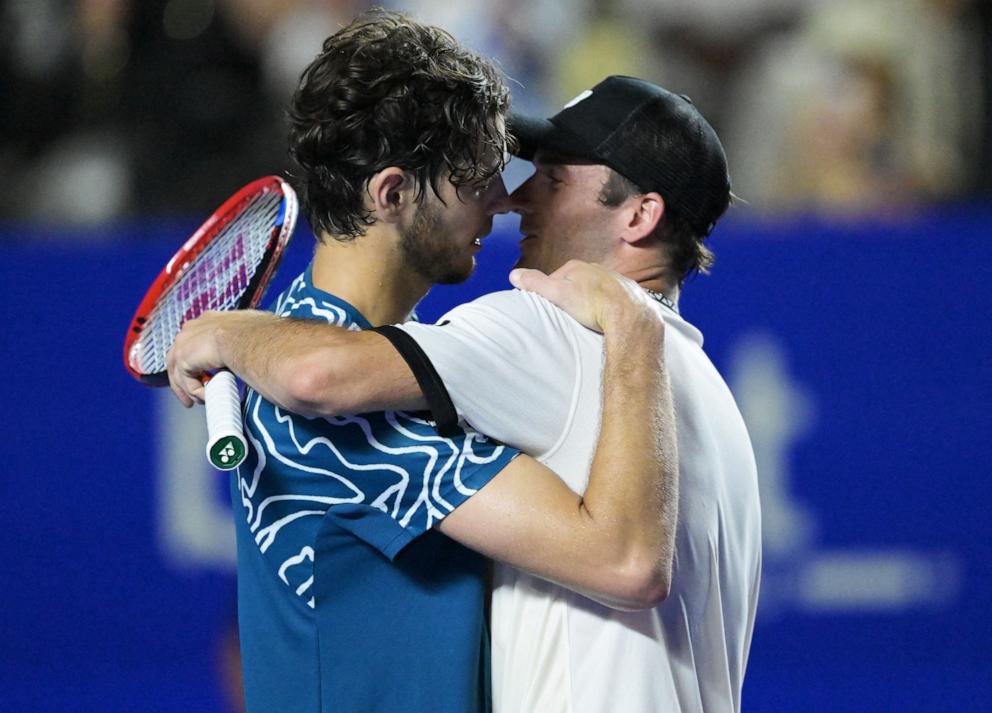 PHOTO: USA's Tommy Paul, right, and Taylor Fritz hug after Paul's victory during semifinals at the Mexico ATP Open 500 men's singles tennis match, March 3, 2023, in Acapulco, Mexico.