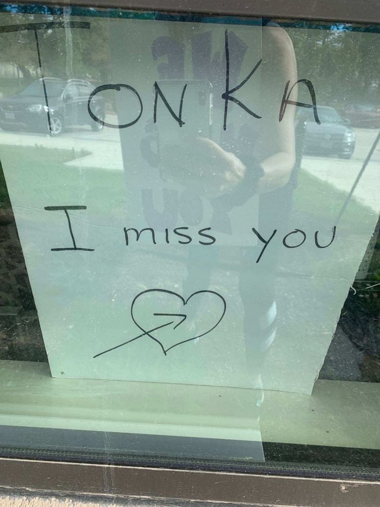 PHOTO: A sign greets Tonka during his visit to residents of Cedar Pointe Health & Wellness Suites on March 17, 2020, in Cedar Pointe, Texas.