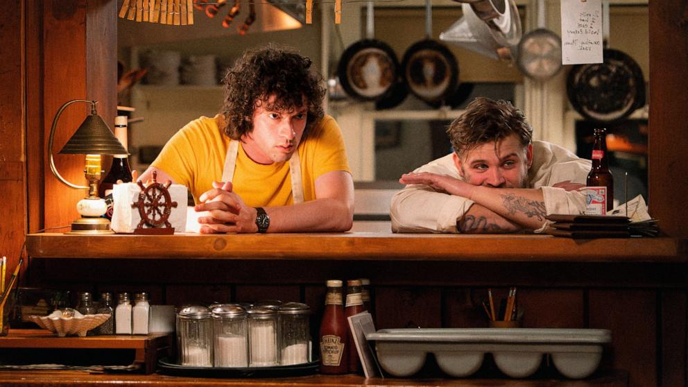 PHOTO: Dominic Sessa, as Anthony Bourdain, left, and Leo Woodall, right, in the biopic "Tony."