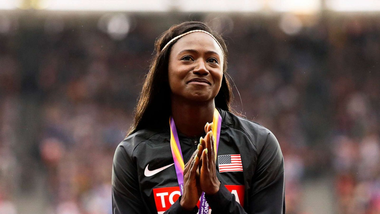 PHOTO: Tori Bowie gestures after receiving the gold medal she won in the women's 100m final during the World Athletics Championships in London, Aug. 7, 2017.