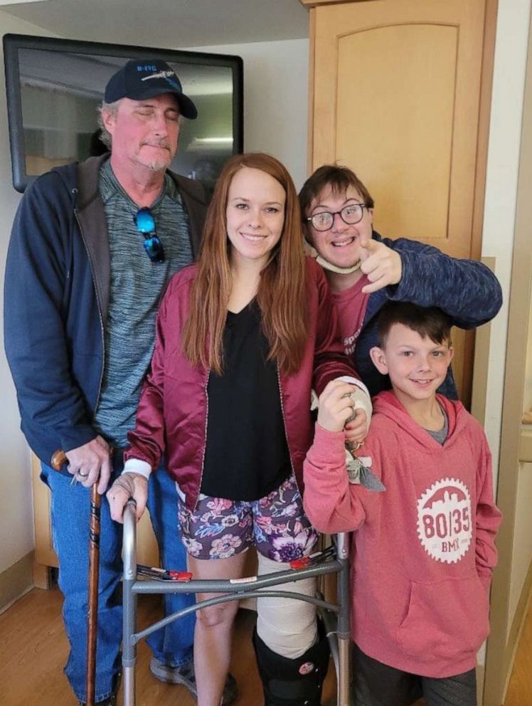 PHOTO: Kuri Bolger, center, poses with her family members who survived the tornado, including her step-father, brother and son.