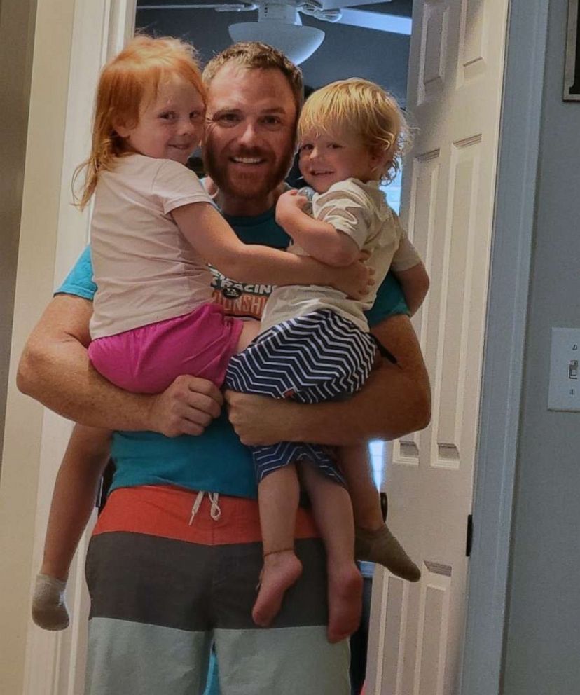 PHOTO: Mike Bolger, 37, holds his daughter, Kinlee, and son, Owen, who all died on March 5, 2022, in a tornado that struck Winterset, Iowa.