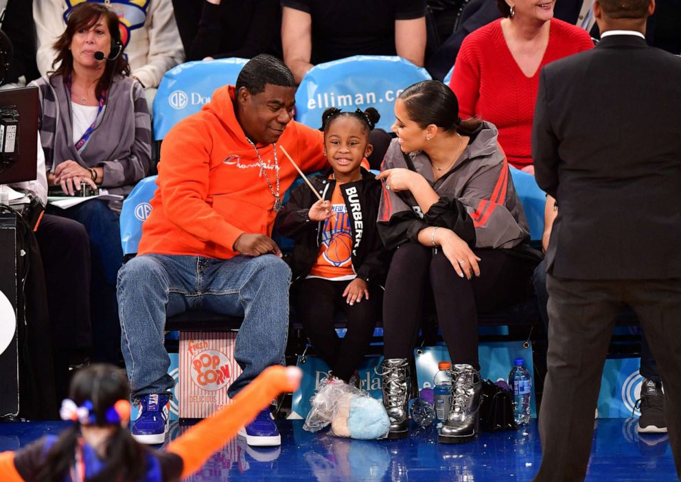 PHOTO: In this file photo, Tracy Morgan, Maven Sonae Morgan and Megan Wollover attend a Los Angeles Clippers v New York Knicks game at Madison Square Garden on March 24, 2019, in New York.