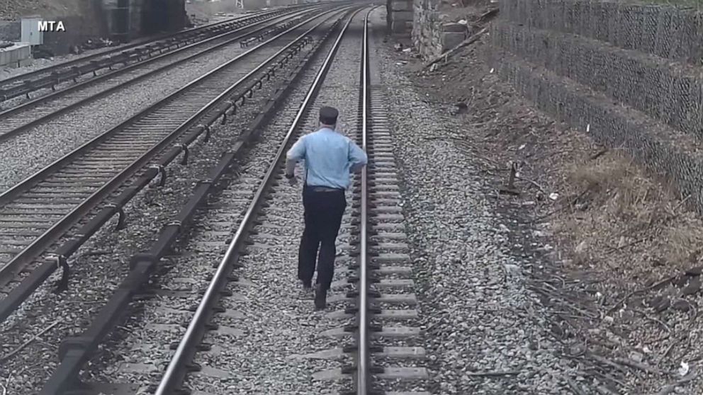VIDEO: Heroes caught on camera saving child who wandered onto train tracks
