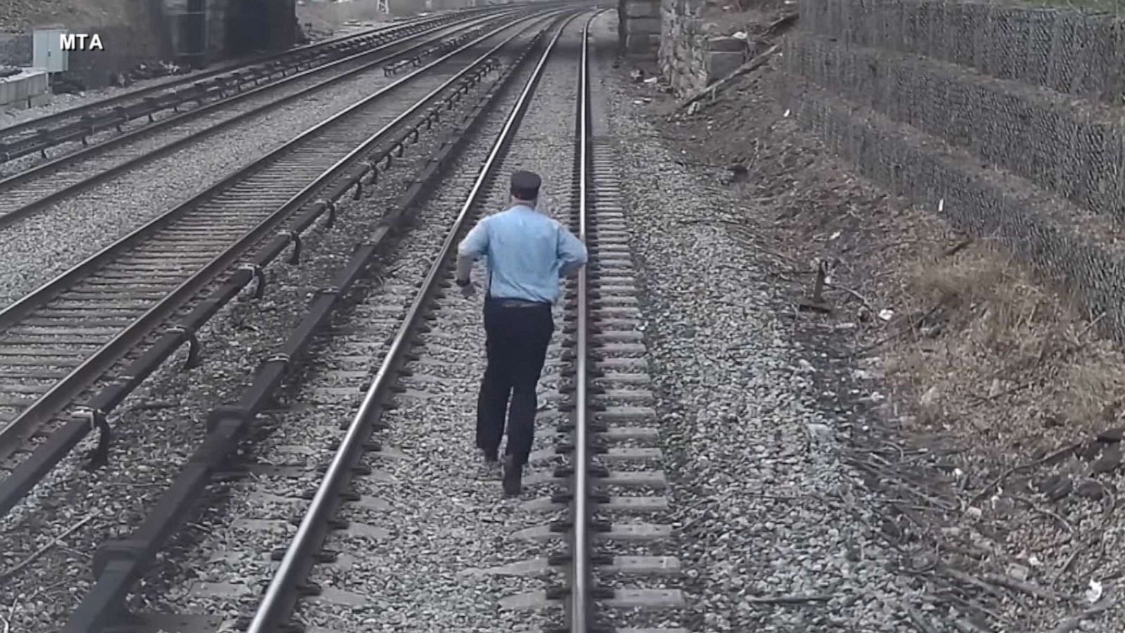 PHOTO: A Metro-North Railroad employee runs down the tracks to rescue a three-year-old boy who wandered onto train tracks in Tarrytown, New York, on April 6, 2023.