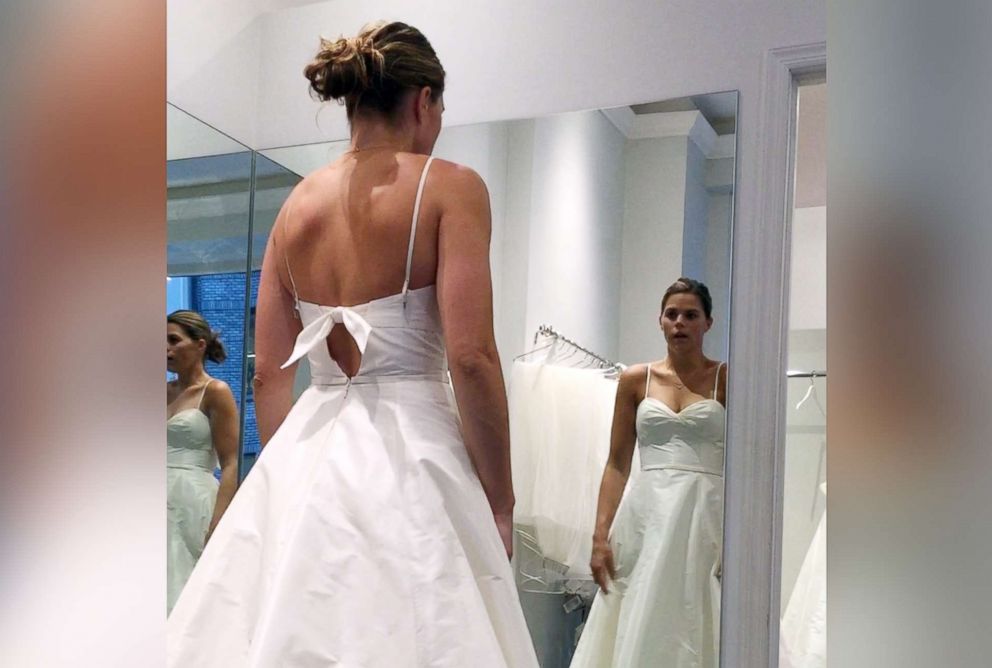 PHOTO: Lanie Parr, of New York City, tries on a wedding dress at the end of "GMA" Train My Way.