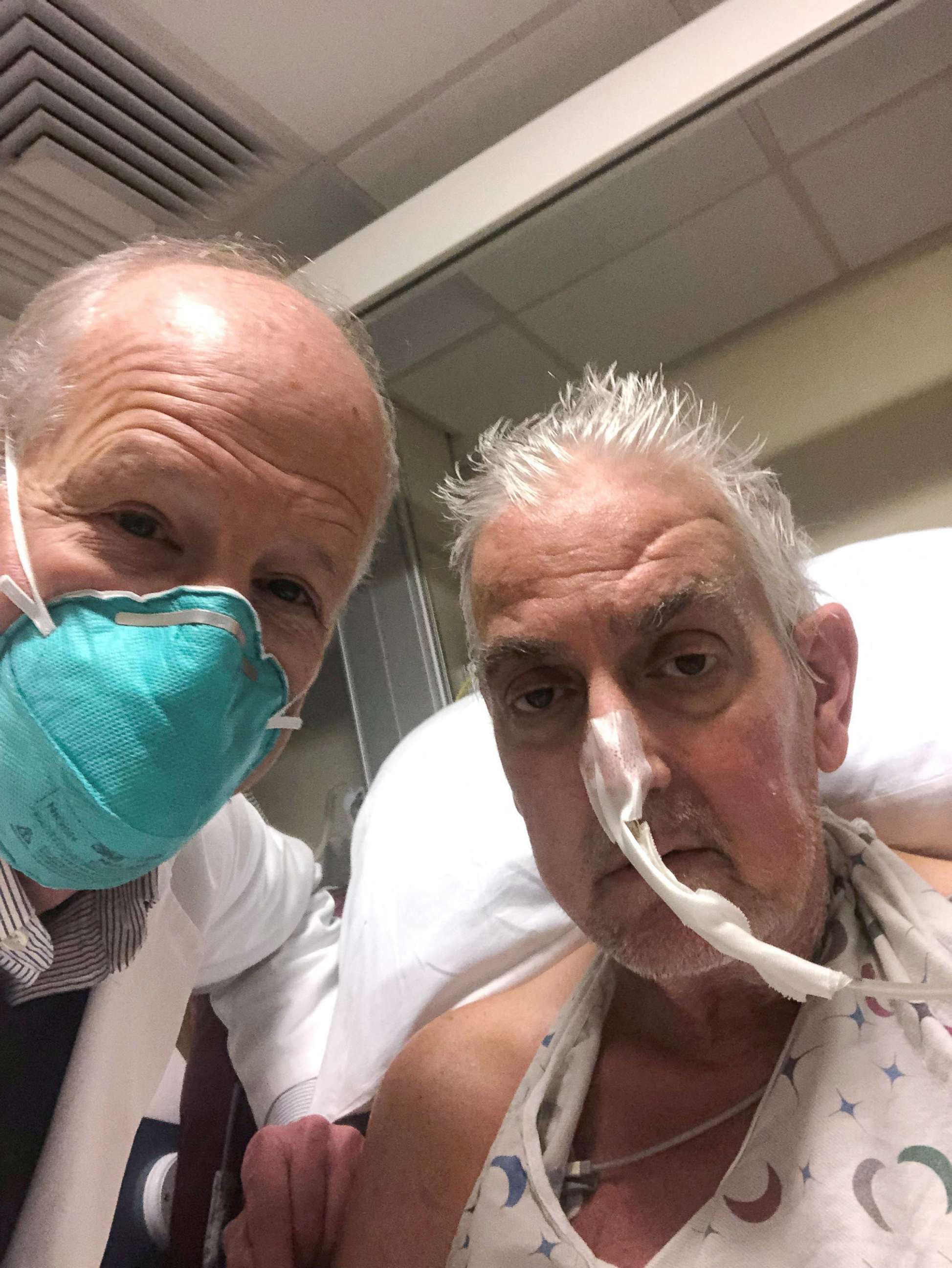 PHOTO: Dr. Bartley Griffith poses for a photo with patient David Bennett, Sr., right, who received a heart implant from a genetically modified pig, in Baltimore, in January 2022.