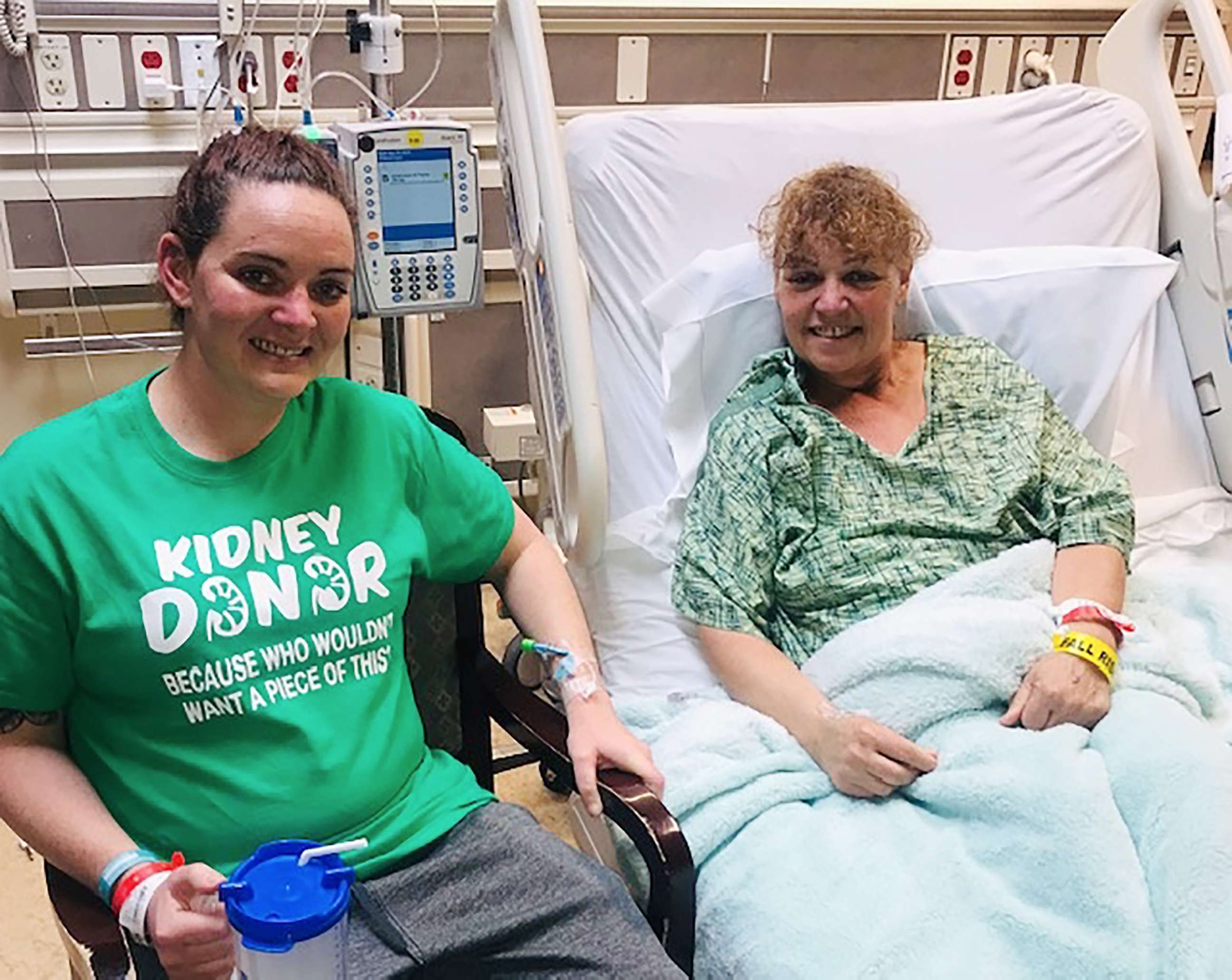 PHOTO: Casey Flory, left, and Debbie Harker pose in the hospital after kidney transplant surgery.