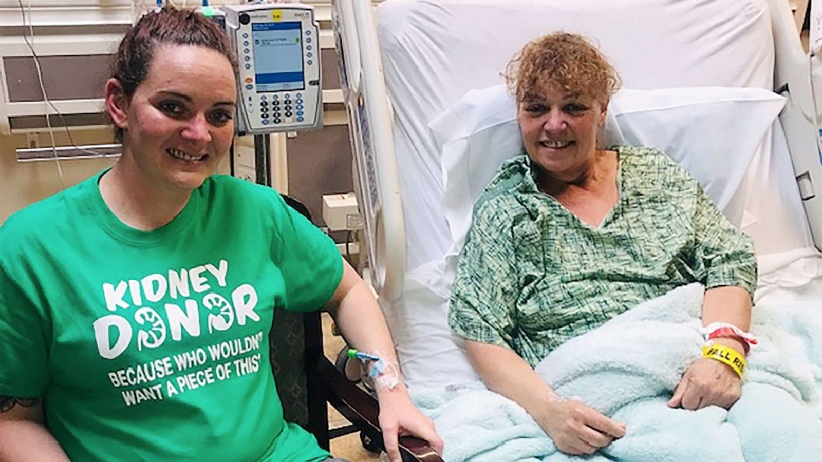 PHOTO: Casey Flory, left, and Debbie Harker pose in the hospital after kidney transplant surgery.