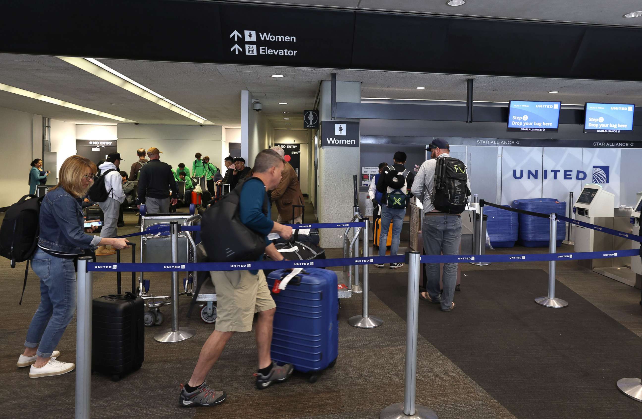 PHOTO: Customers check in for flights at San Francisco International Airport, May 12, 2022, in San Francisco.