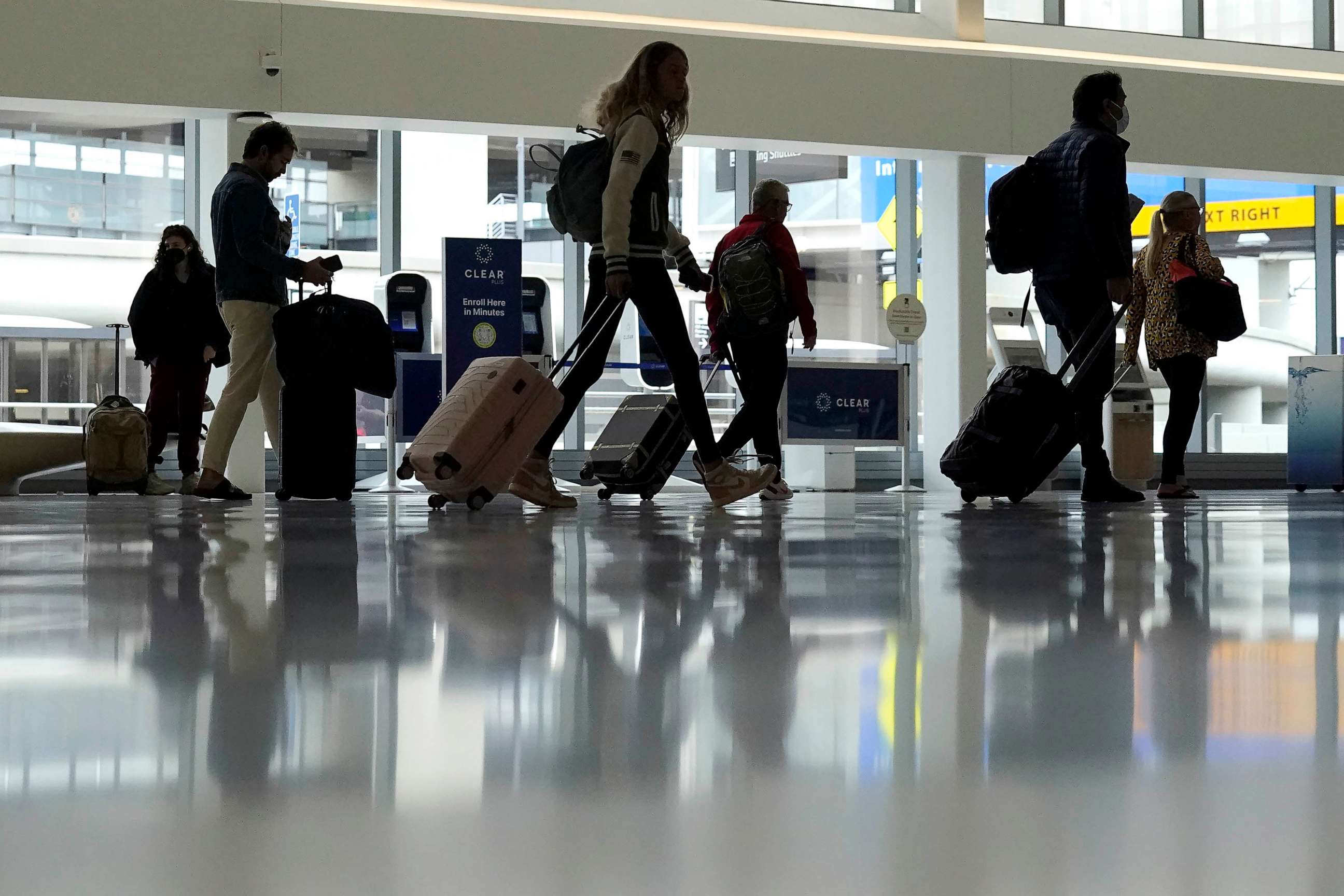 PHOTO: FILE - Travelers walk through a domestic terminal at San Francisco International Airport in San Francisco, May 26, 2023.