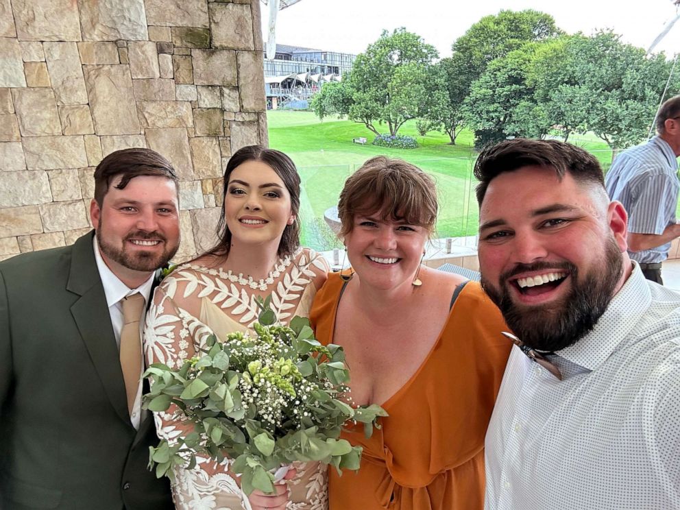 PHOTO: Daniel Crouch, Simone Crouch, Emily Heath, and Jeff Irlbeck posed for a selfie at the Crouch wedding.