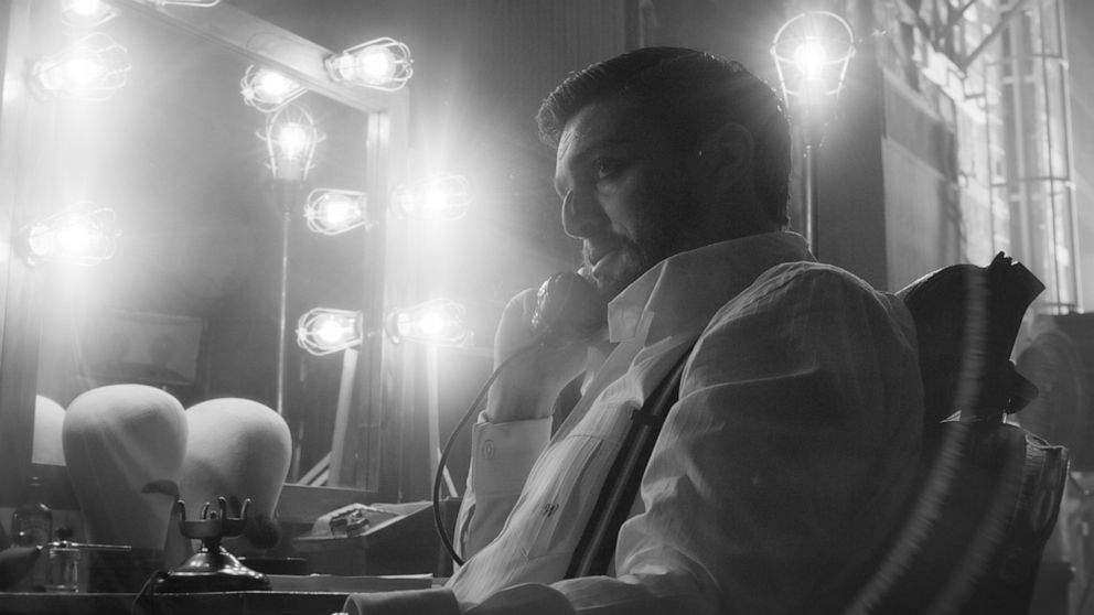 PHOTO: Tom Burke portrays Orson Welles in David Fincher's film "Mank". 