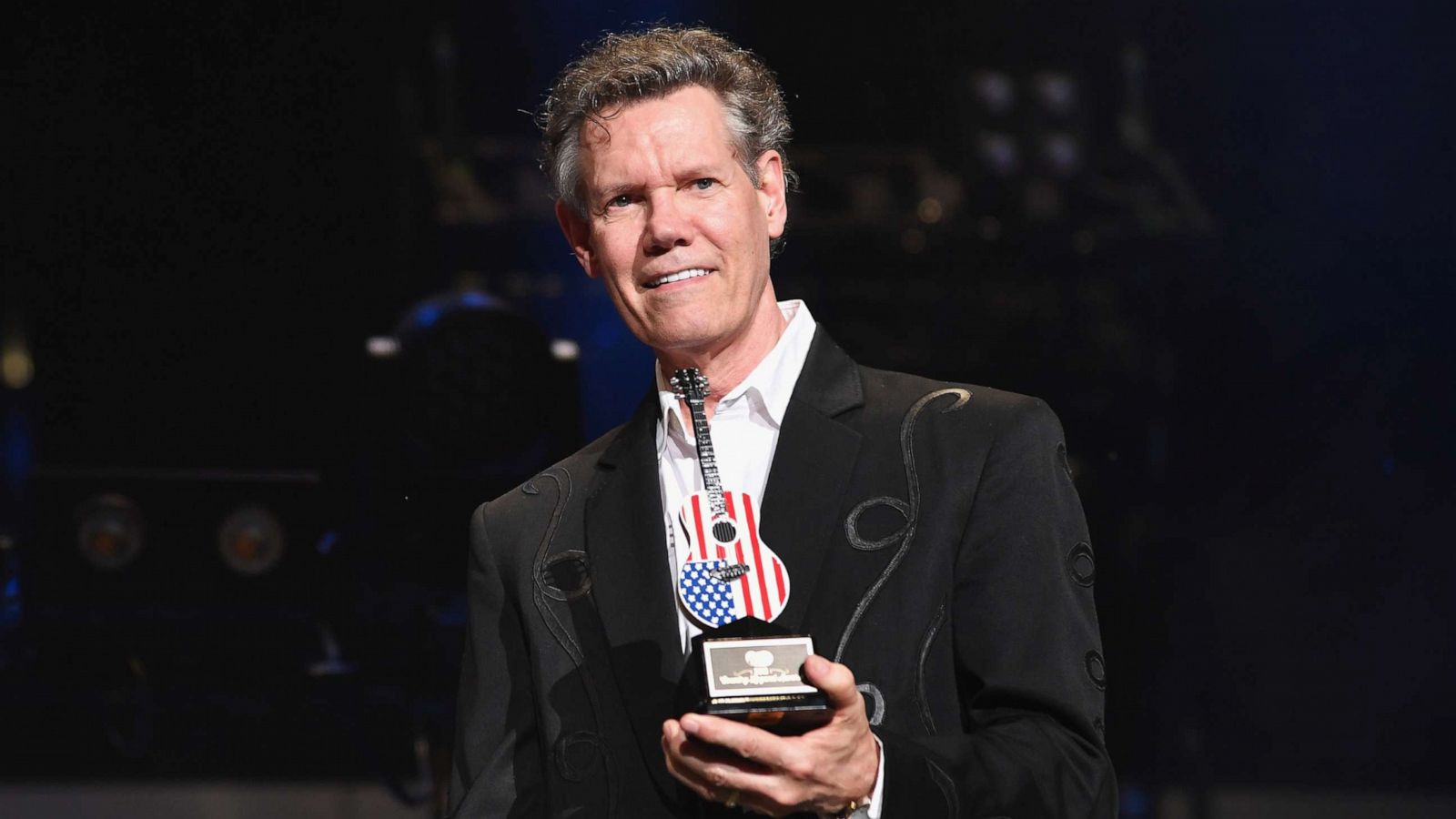 PHOTO:Randy Travis receives an award during the 2018 CMA Music festival on June 9, 2018.